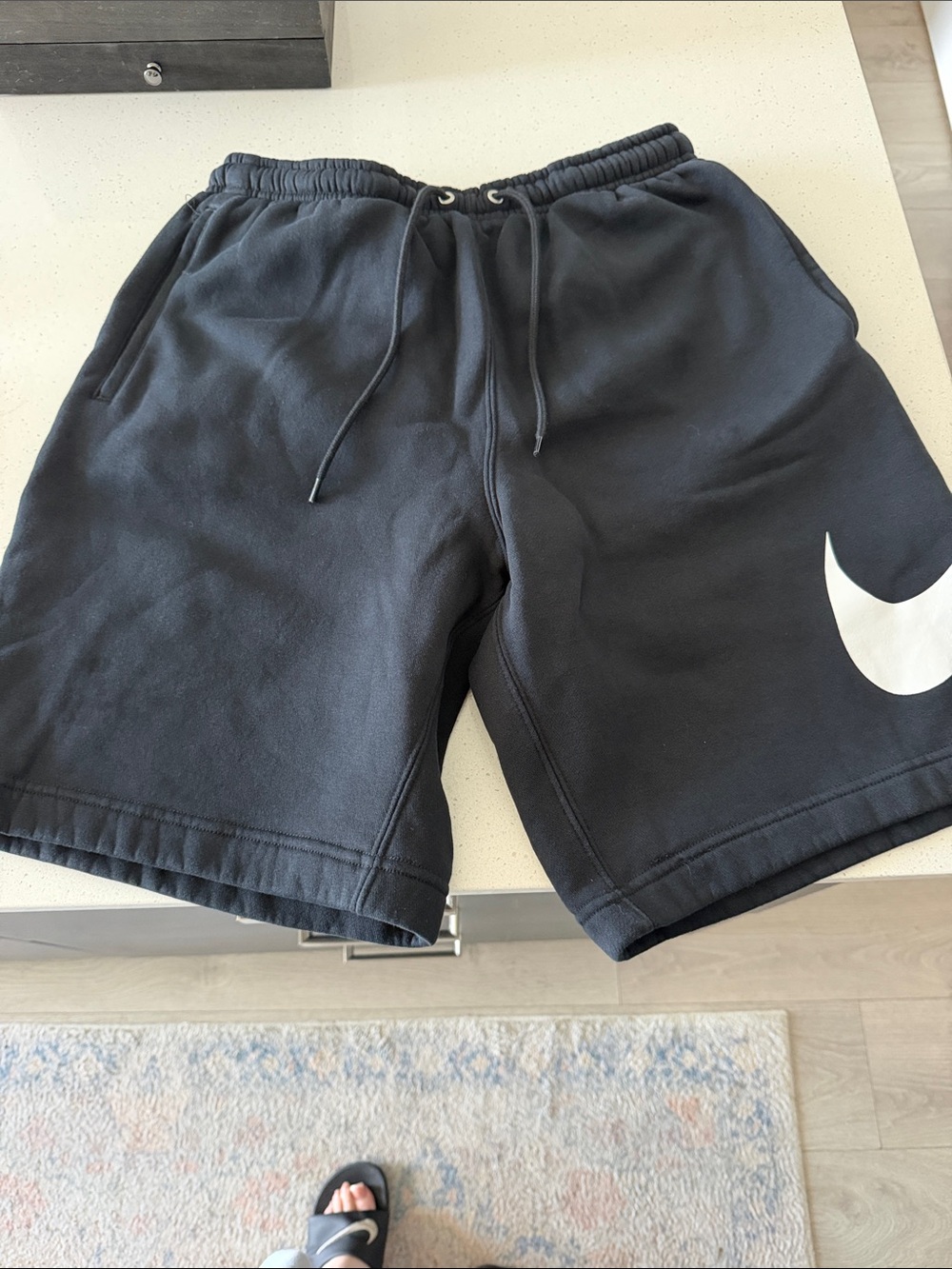 Nike Black Athletic Drawstring Shorts with White Swoosh